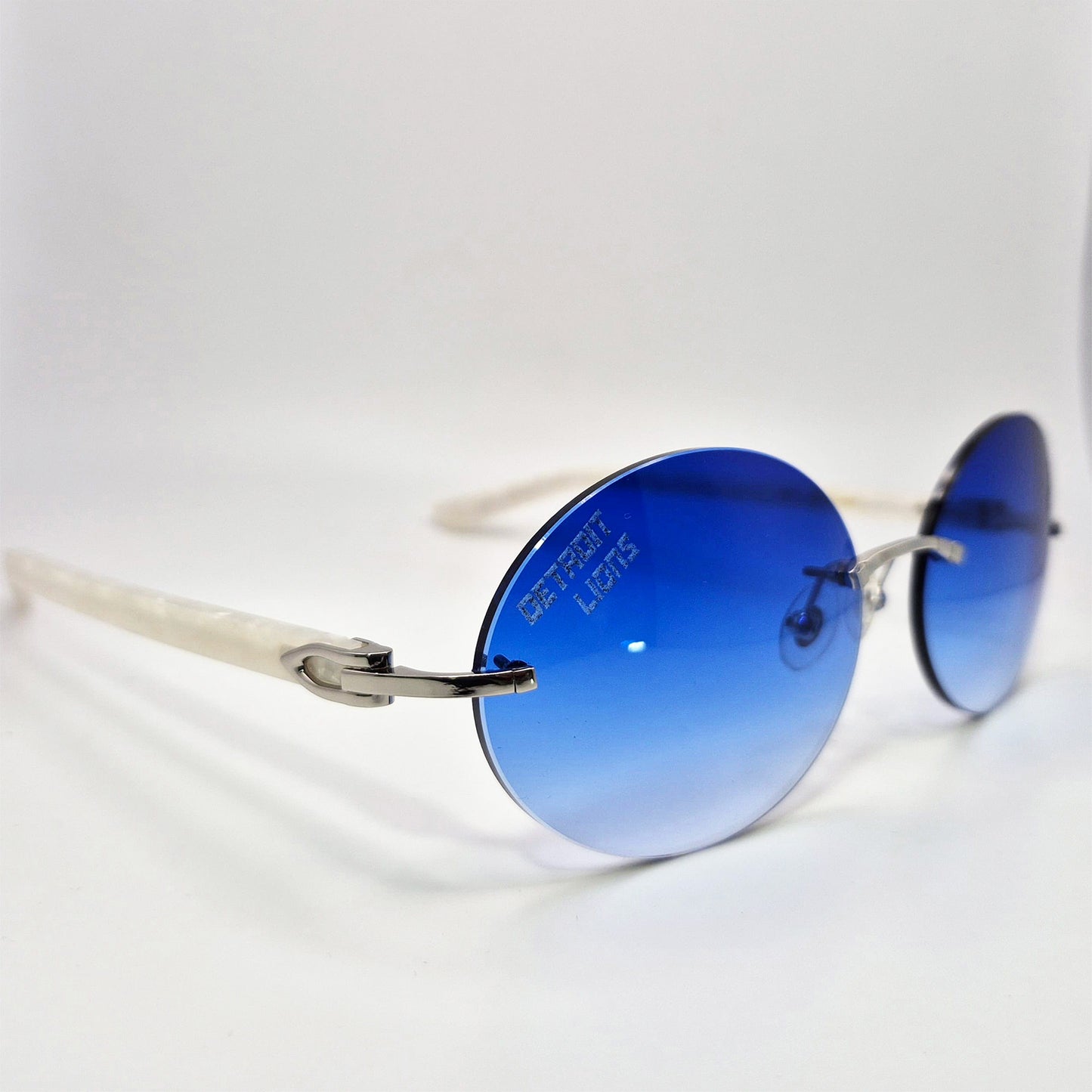 C Decor "Detroit Lions" - Silver Marbles w/ Deep Blue Oval Lenses